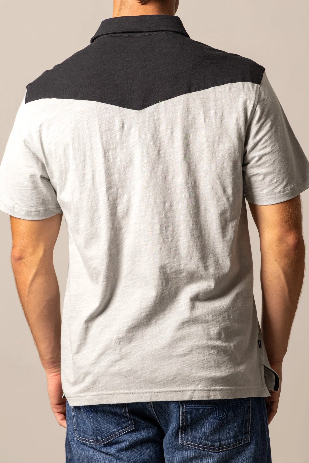 Kimes Ranch G-2 Polo in Grey, back view, with a black yoke and collar