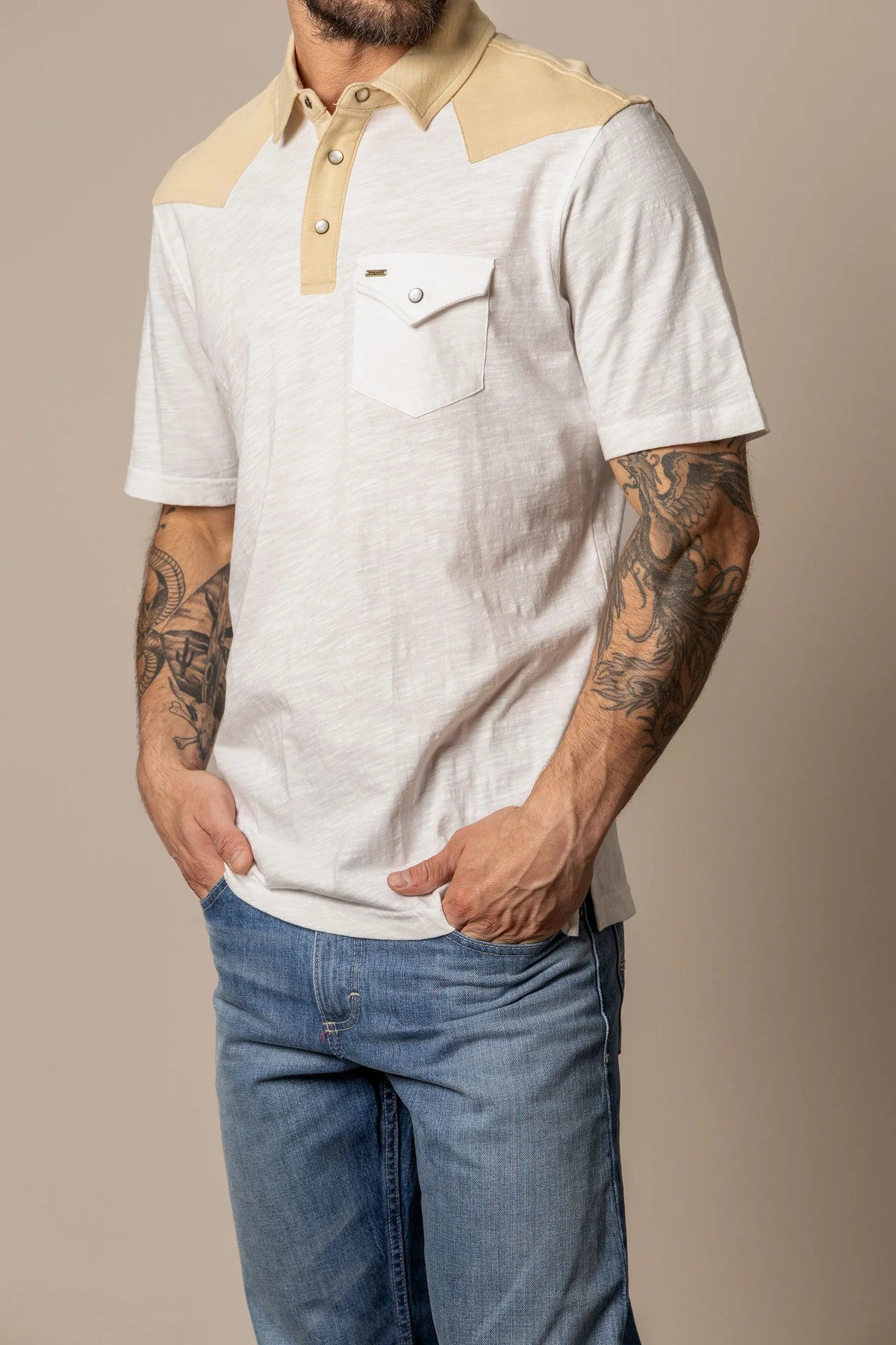 Kimes Ranch G-2 Polo in Natural with a tan yoke and collar, a chest pocket, and a three-button placket