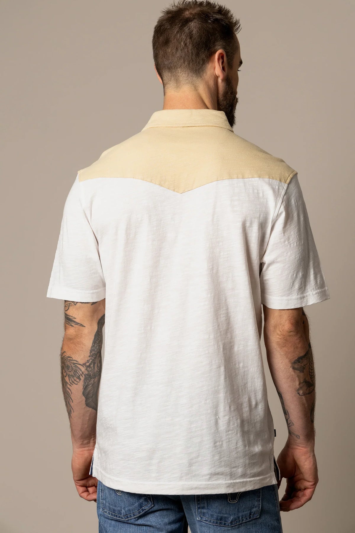 Kimes Ranch G-2 Polo in Natural, back view, with a colorblocked yoke and short sleeves