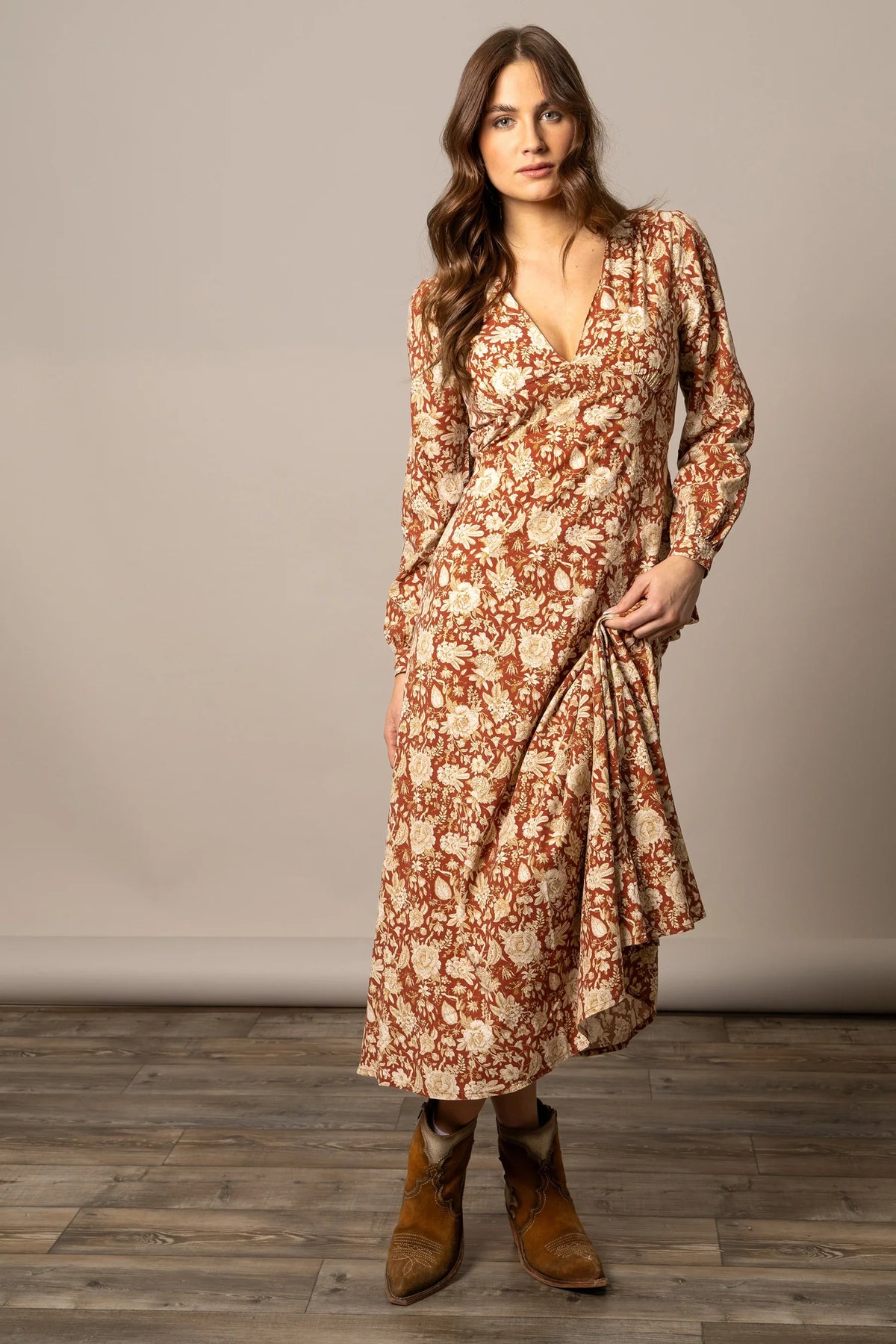 Kimes Ranch Georgia dress in Burnt Red with a floral print, long sleeves, and a wrap skirt