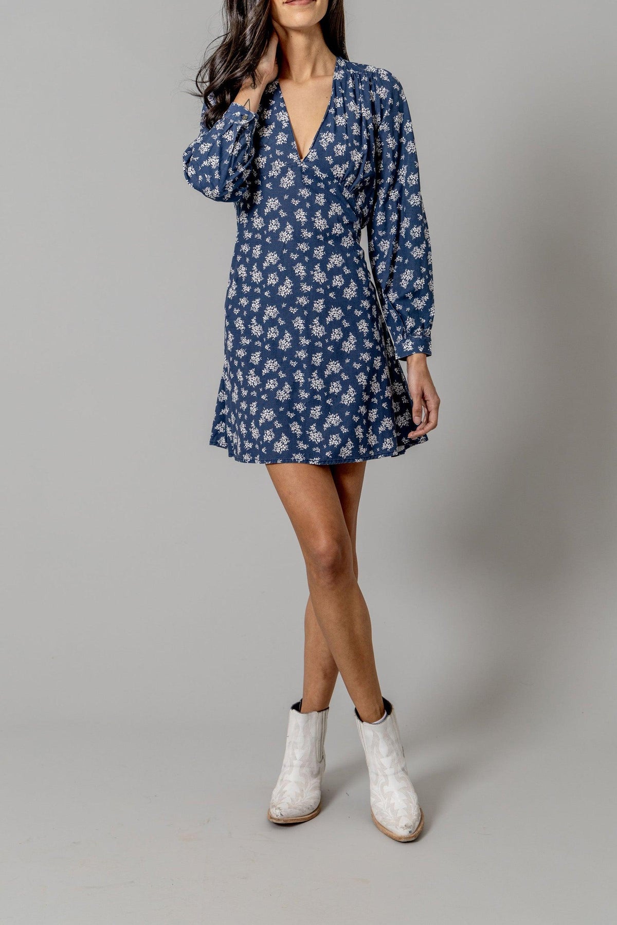 Kimes Ranch Georgina Tencel Dress in Blue with a white floral print, long sleeves, and a V-neckline
