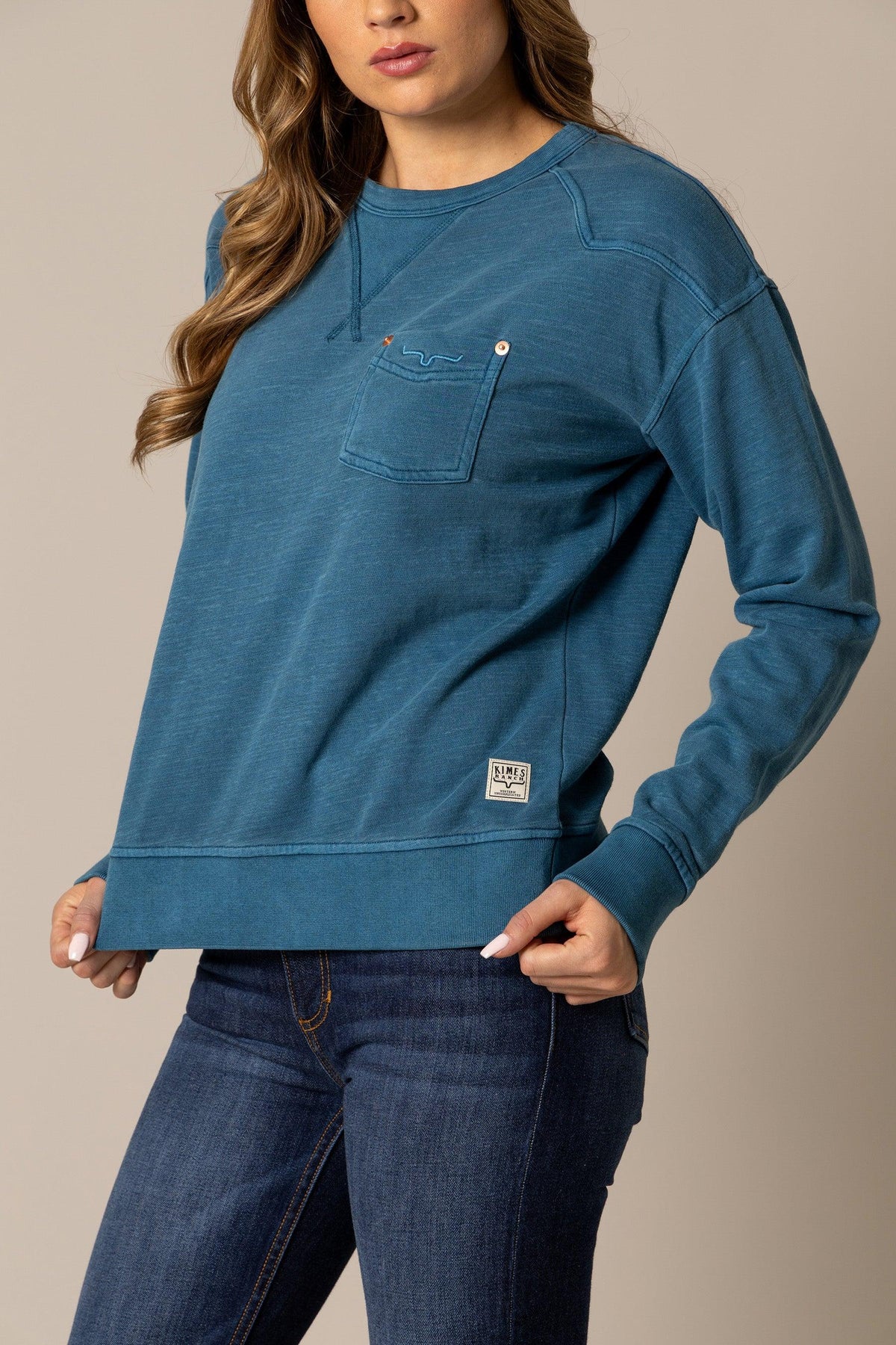 Kimes Ranch Gina Western Crew sweatshirt in Mid Blue with a chest pocket and embroidered logo