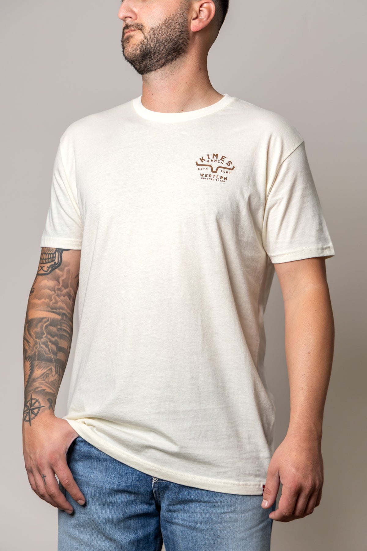 Kimes Ranch Grandview shirt in Natural with a chest logo reading Western Uncomplicated