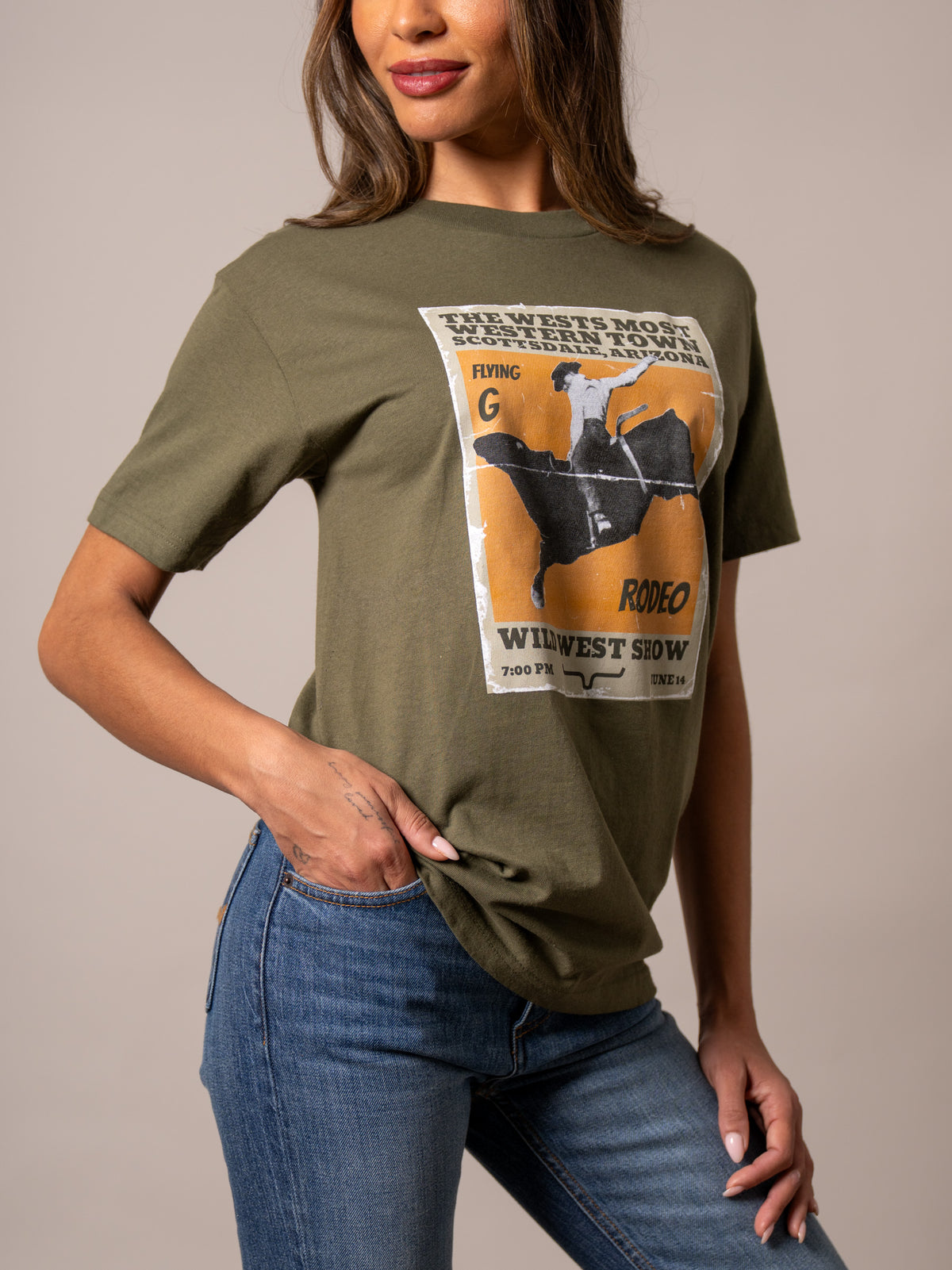 Kimes Ranch Ladies Greg 1950 shirt in Military Green with a vintage rodeo poster graphic