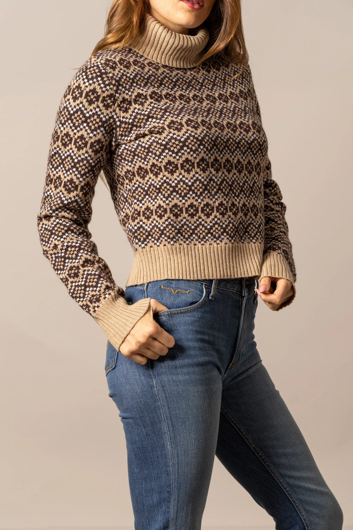 Kimes Ranch Hazel Turtleneck sweater in Coffee, side view, with a brown and tan geometric knit pattern