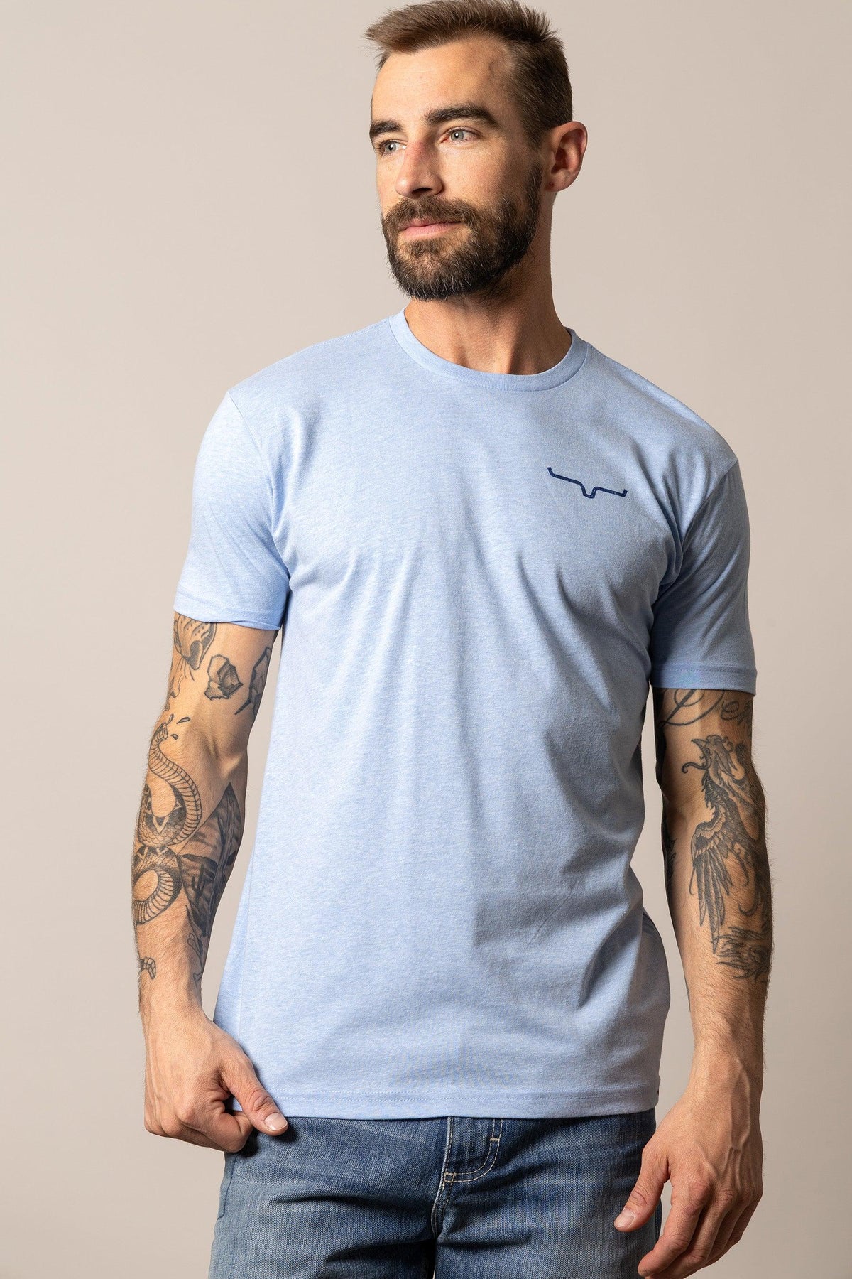Kimes Ranch Desert Diamond shirt in Heather Columbia Blue with short sleeves and the Kimes Ranch logo on the chest