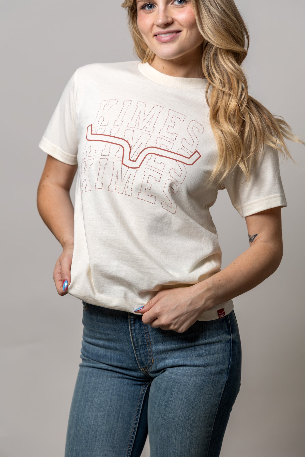 Kimes Ranch Heavy Branded shirt in Cream with a graphic of the brand name in red outline lettering