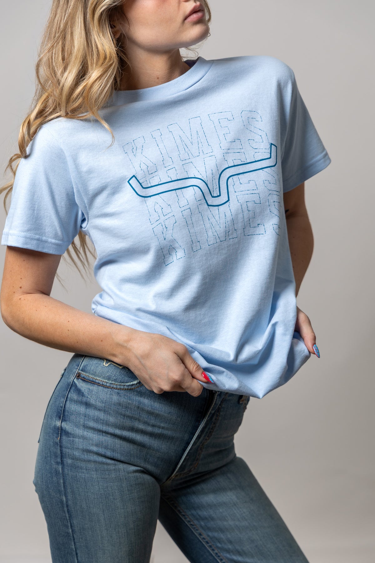Kimes Ranch Heavy Branded shirt in Ocean with a graphic of the word KIMES repeated with a blue line through it