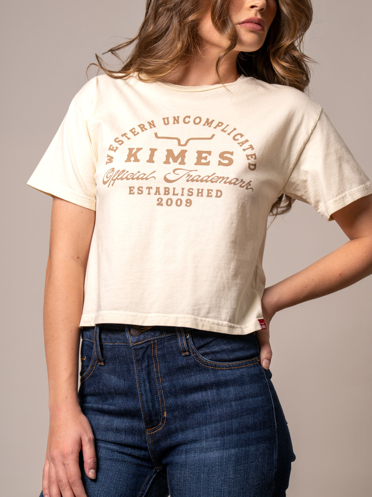 Kimes Ranch Heavy Text shirt in Ivory with a Western Uncomplicated Kimes Official Trademark Established 2009 graphic