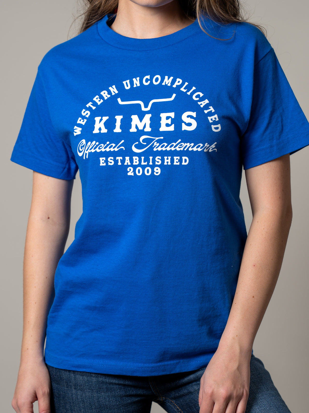 Kimes Ranch Branded shirt with a white graphic print featuring the brand name and Western Uncomplicated text