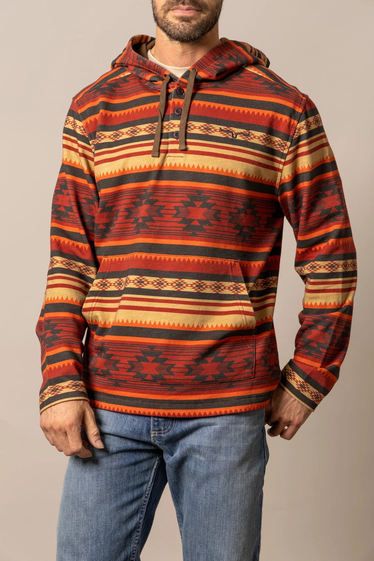 Kimes Ranch Hermosa Hoodie in Brick Red with a multi-color geometric pattern and front kangaroo pocket