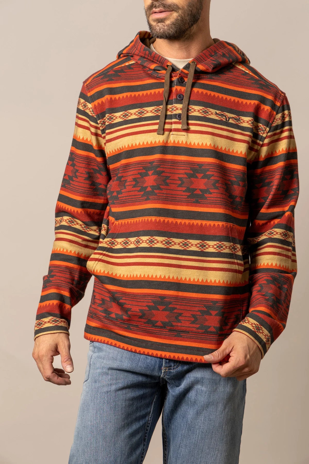 Kimes Ranch Hermosa Hoodie in Brick Red with a hooded neckline, front kangaroo pocket, and geometric patterned stripes