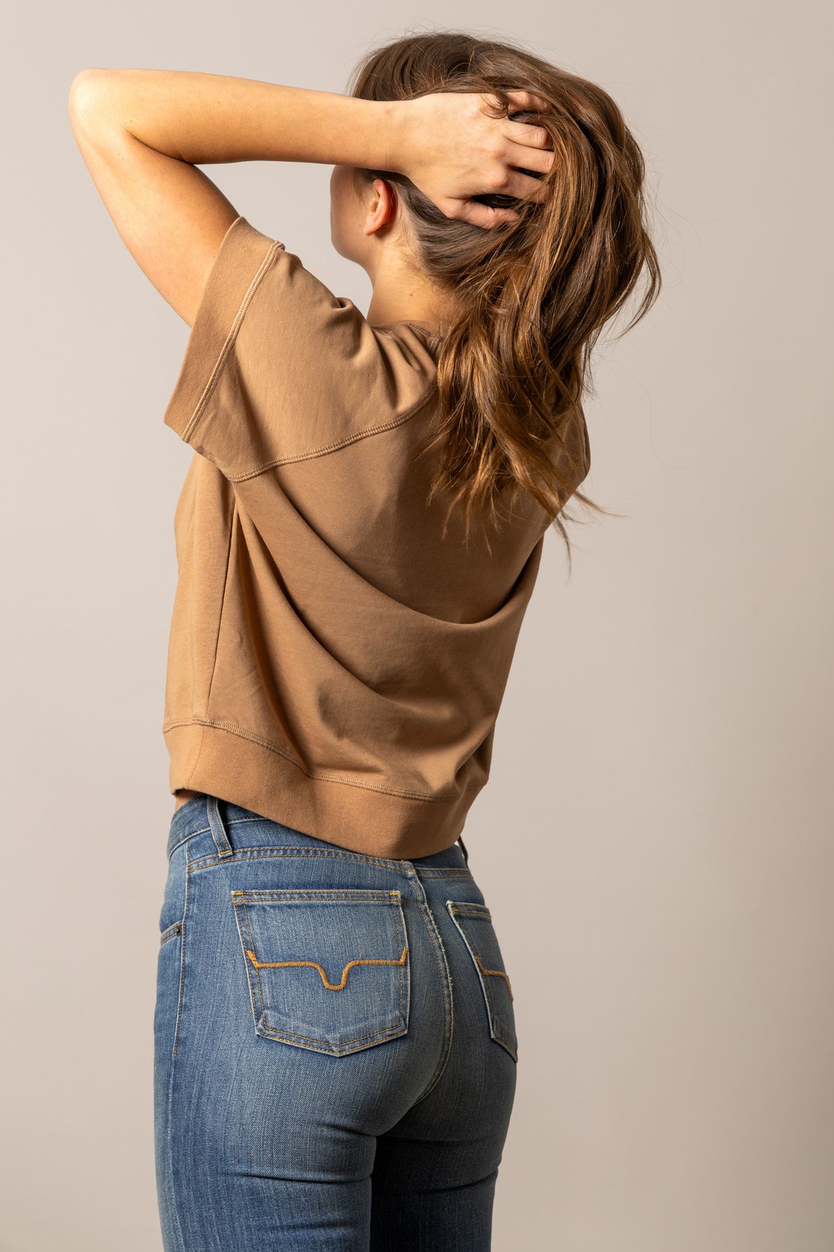 Kimes Ranch Holly sweatshirt in Tobacco, back view, with a back yoke seam and ribbed hem