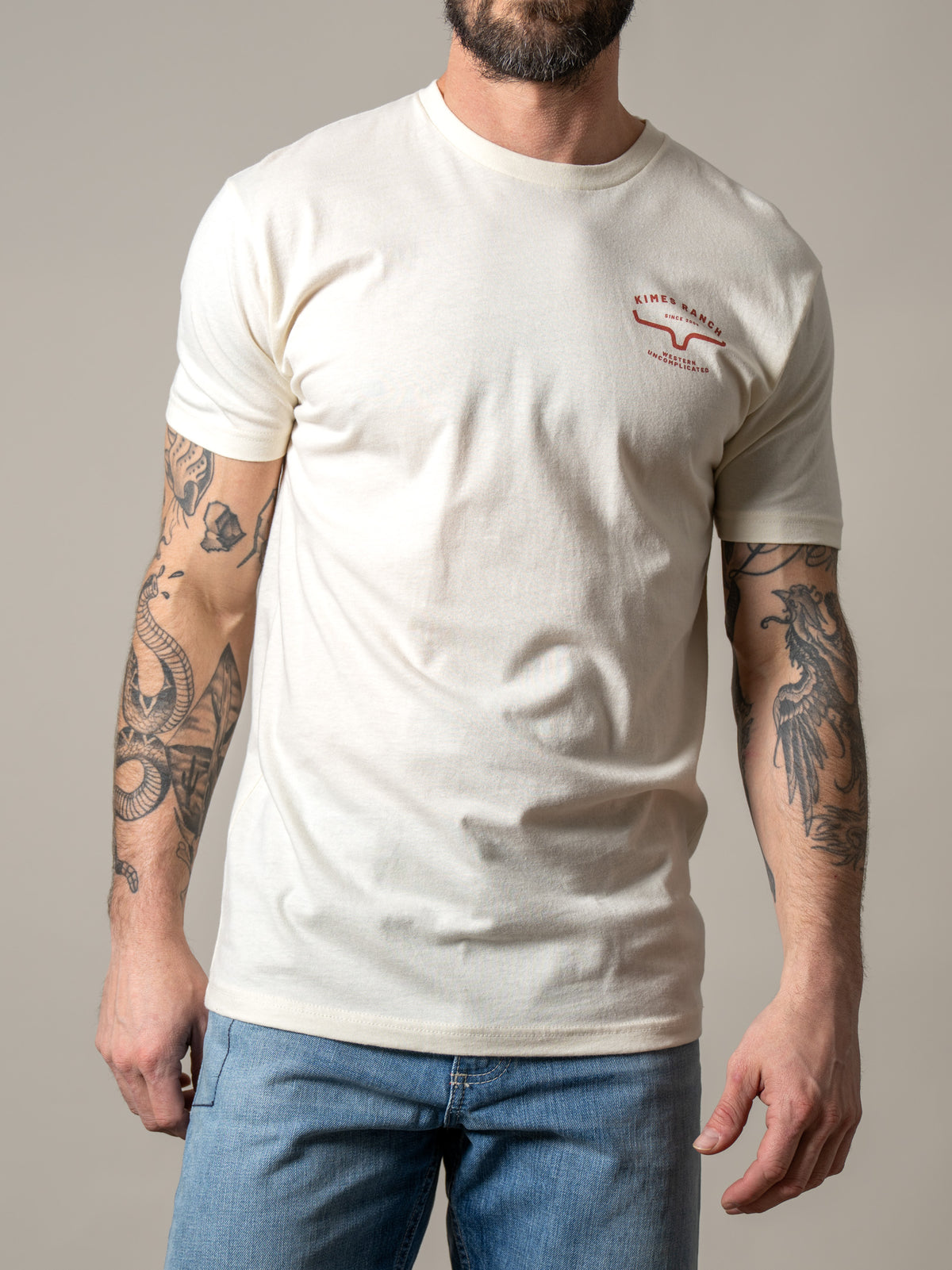 Kimes Ranch Honor shirt in Natural with a chest logo and short sleeves