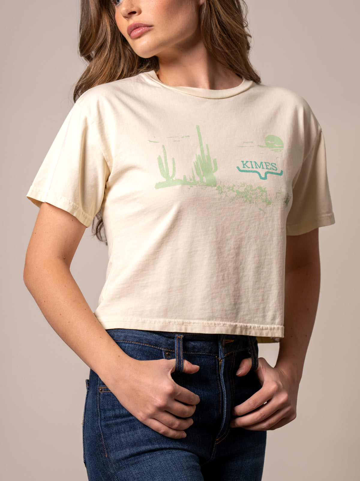 Kimes Ranch Horizon West shirt in Ivory with a green cactus graphic and Kimes Ranch logo
