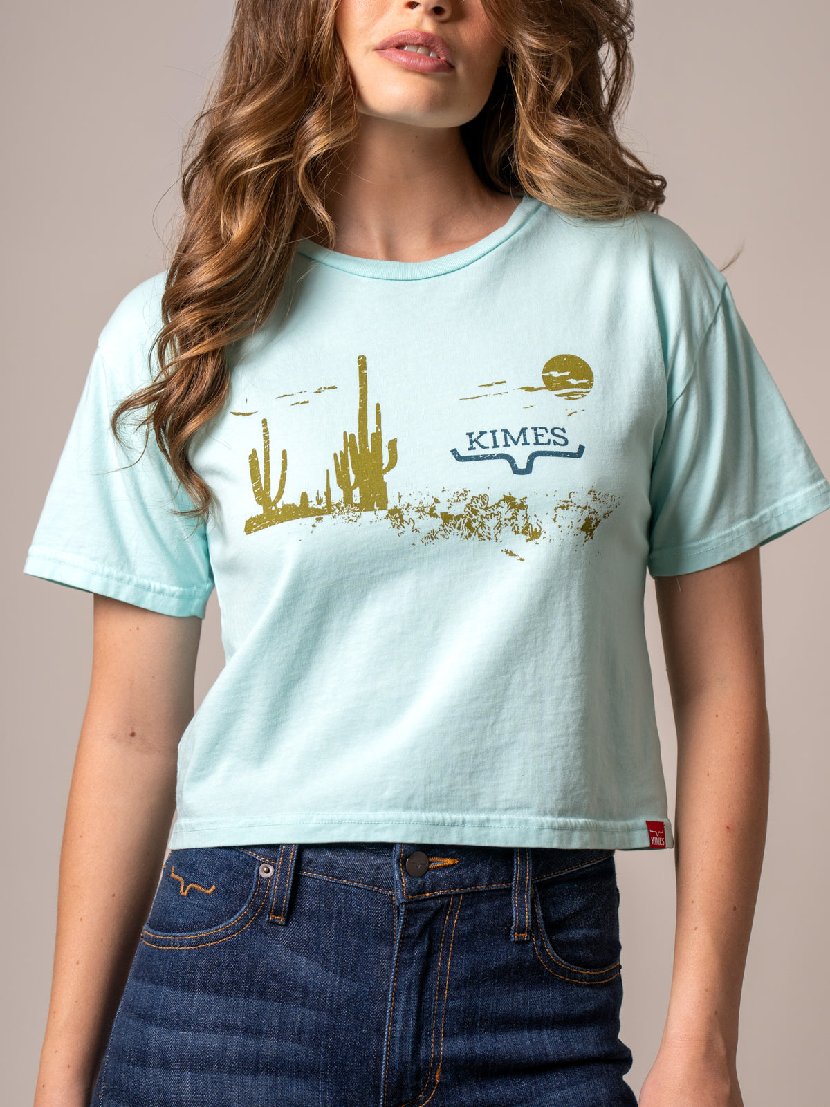 Kimes Ranch Horizon West Mint shirt with a gold cactus and KIMES logo print