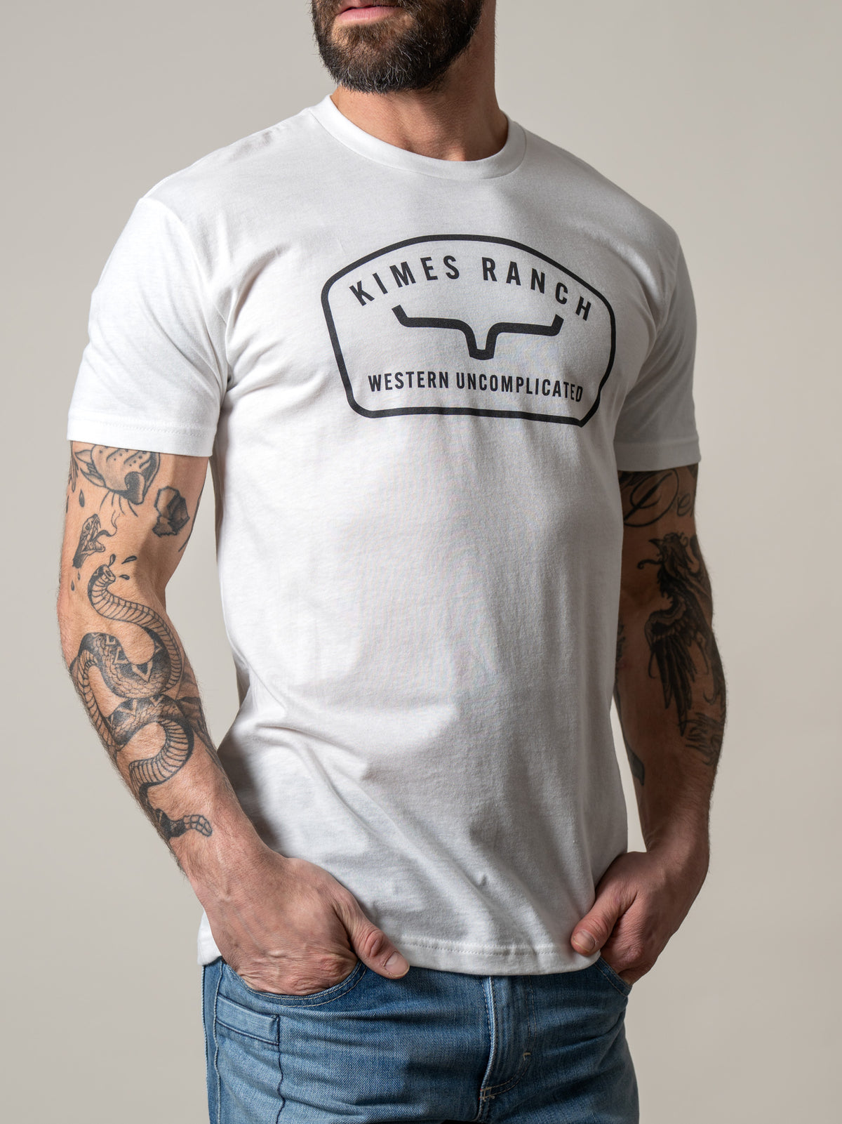Kimes Ranch Hunton White short sleeve shirt with Kimes Ranch logo and Western Uncomplicated text