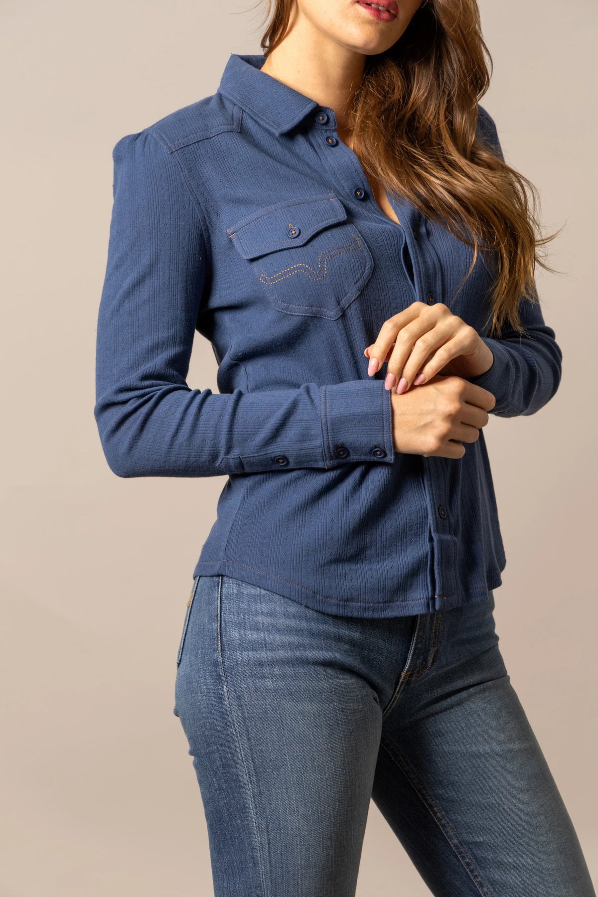 Kimes Ranch Isabel Pointelle top in Dark Blue, side view, with long sleeves and a chest pocket with contrast stitching
