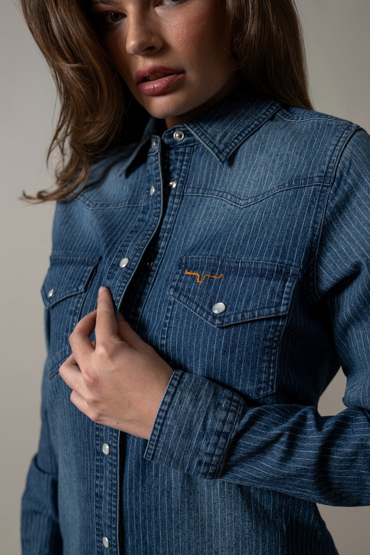 Kimes Ranch Jordi Mini Stripe shirt with long sleeves, button front, and chest pockets with the Kimes Ranch logo