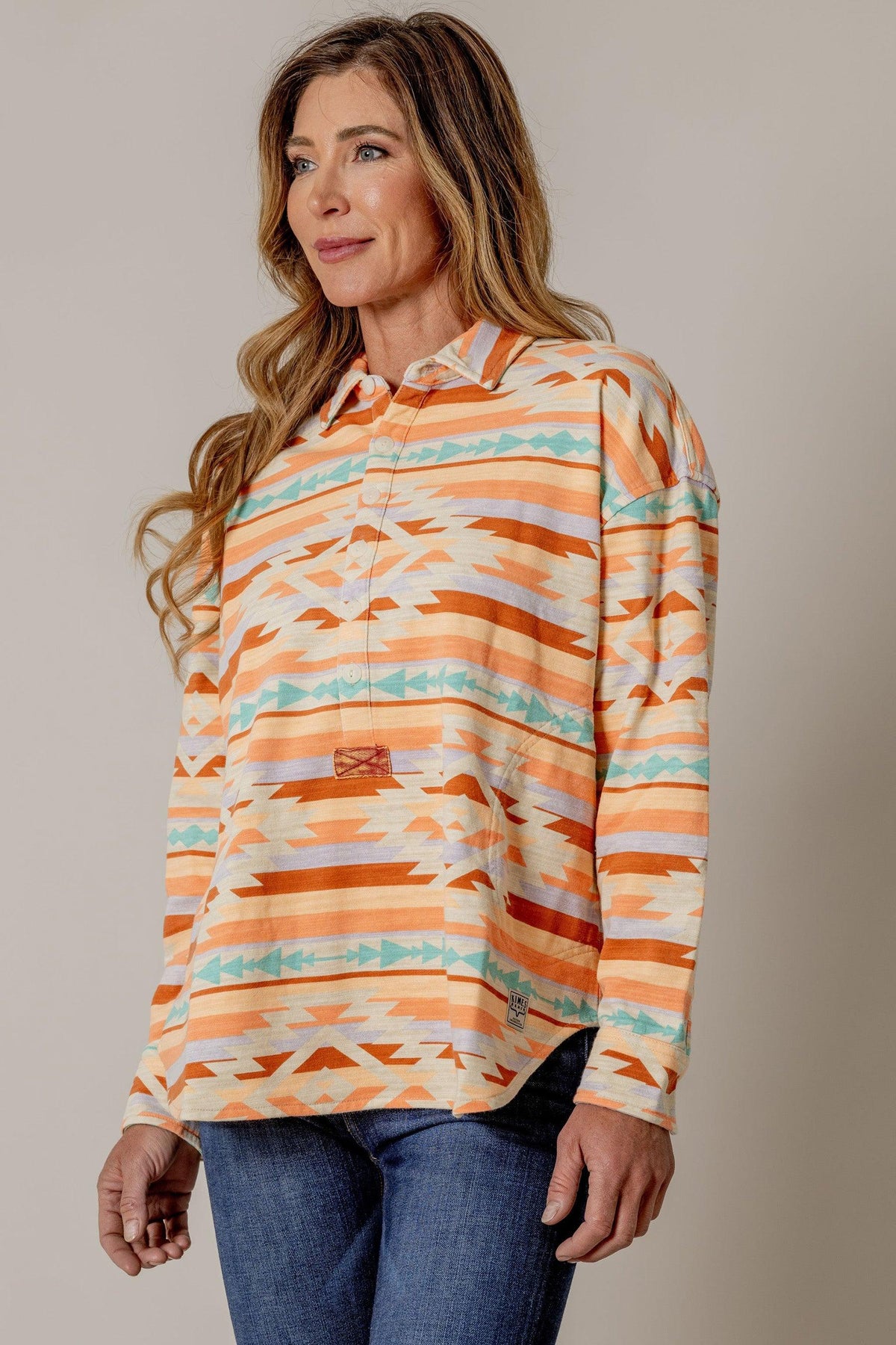 Kimes Ranch Judith sweater in Orange with a geometric pattern and long sleeves