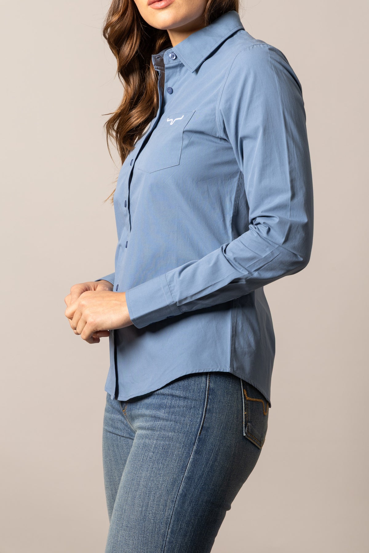 Kimes Ranch Ladies KR Team Shirt in Carbon Blue, side view, with long sleeves and a chest pocket