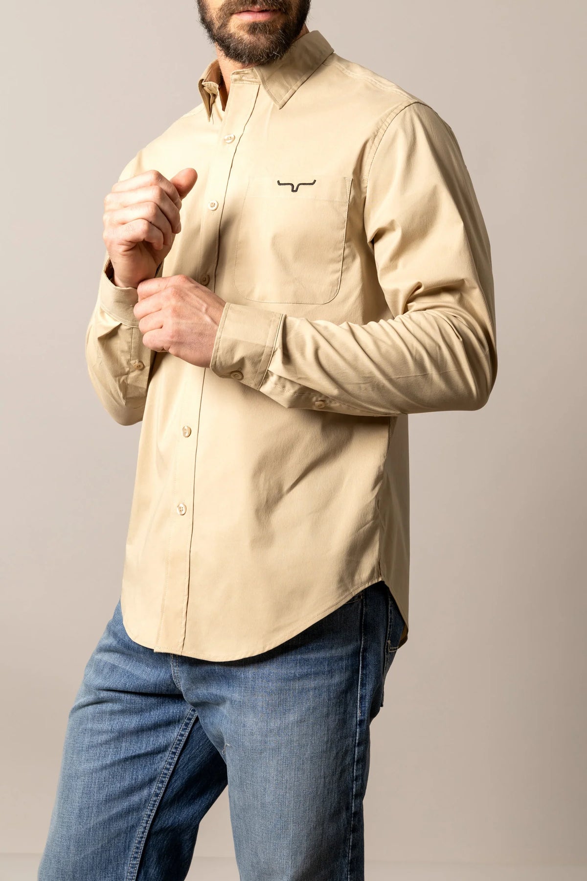 Kimes Ranch KR Team Dress Shirt in Khaki, side view, with a chest pocket and embroidered logo