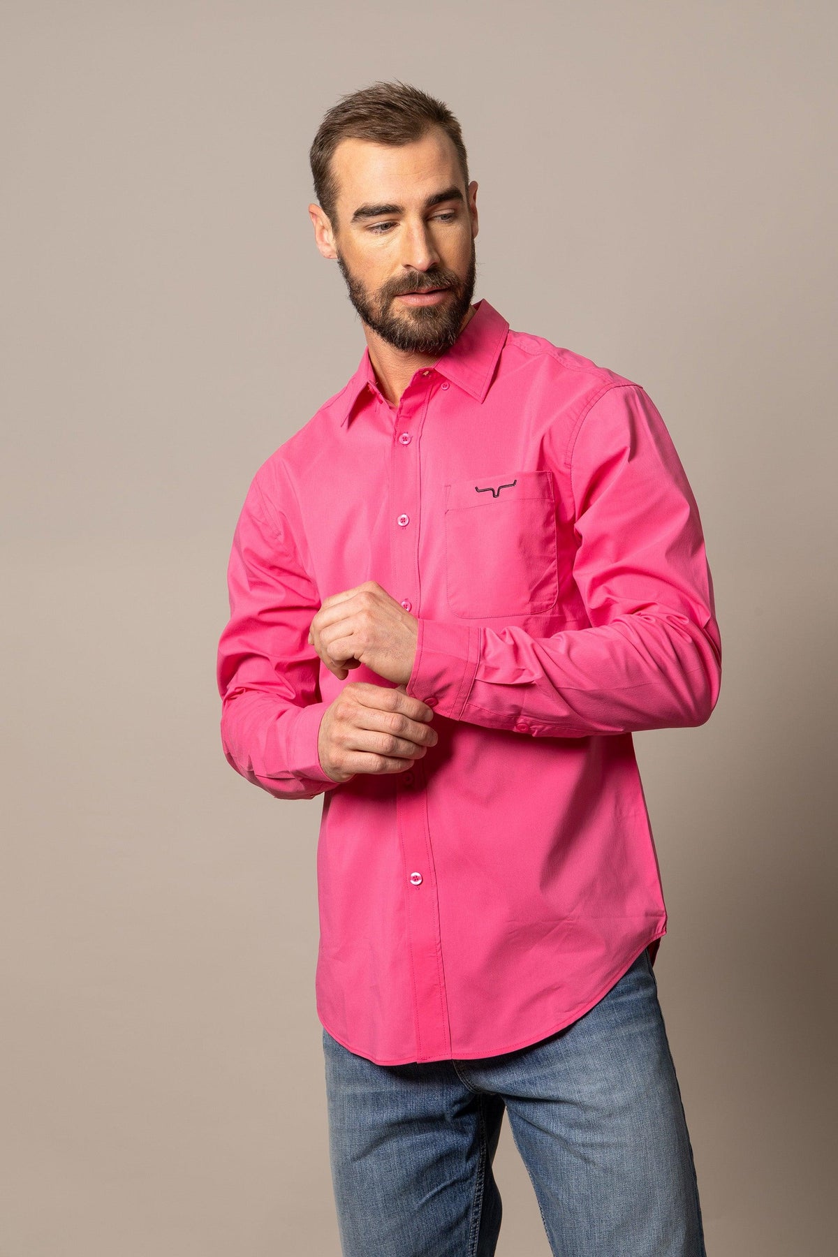 Kimes Ranch KR Team Dress Shirt in Pink with long sleeves and a chest pocket with the Kimes Ranch logo