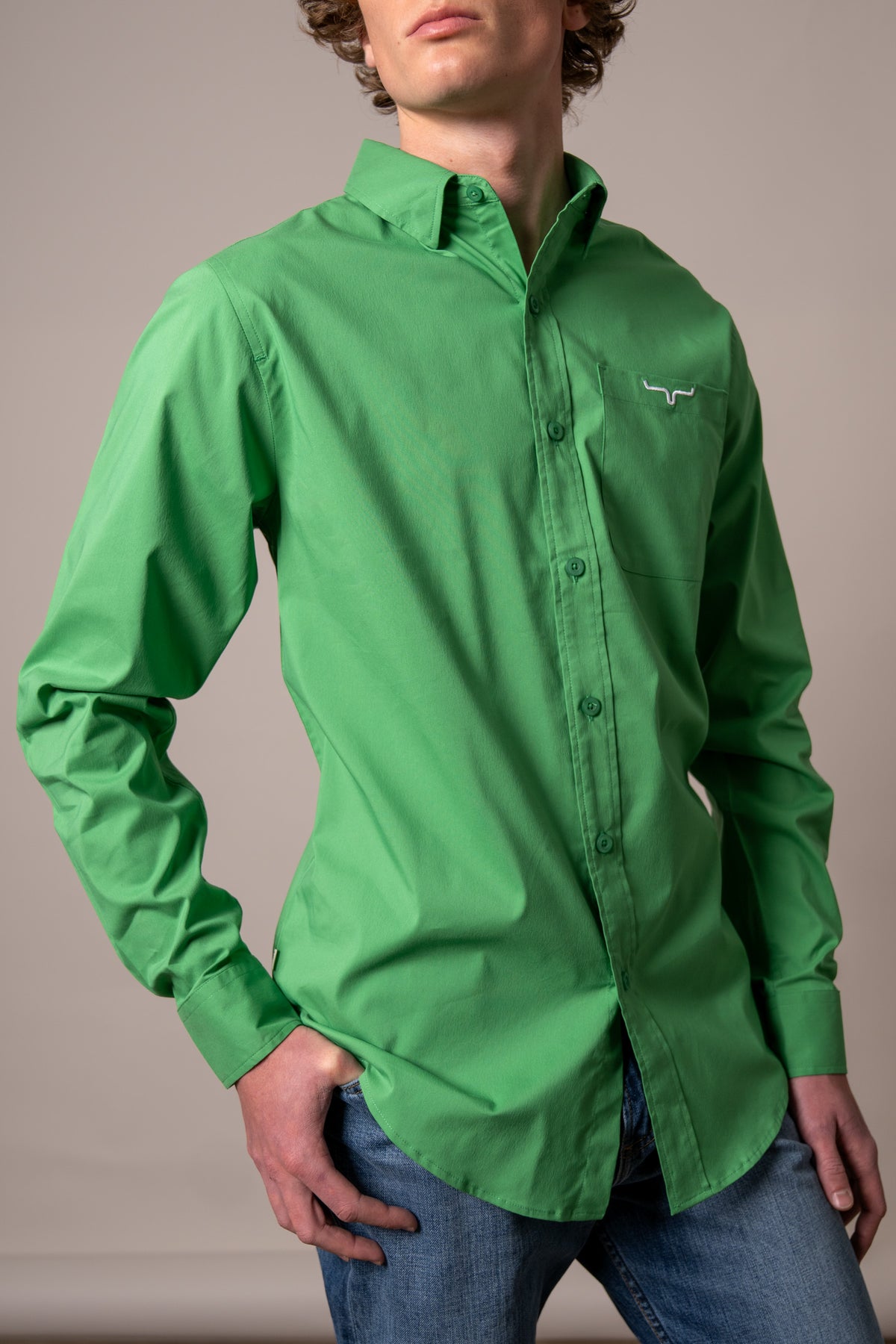 Kimes Ranch KR Team Dress Shirt in Kelly Green with long sleeves and a chest pocket with the Kimes Ranch logo