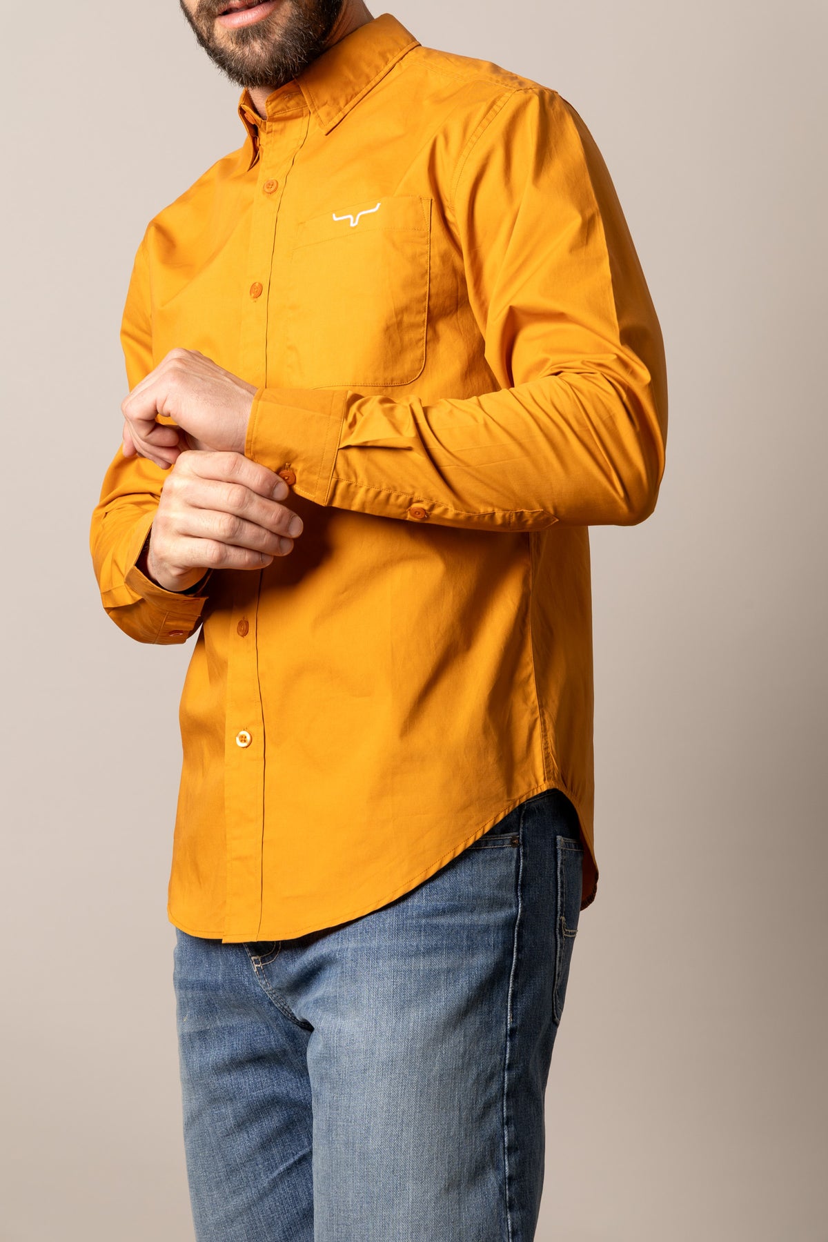Kimes Ranch KR Team Dress Shirt in Vintage Orange, side view, with long sleeves and chest pocket