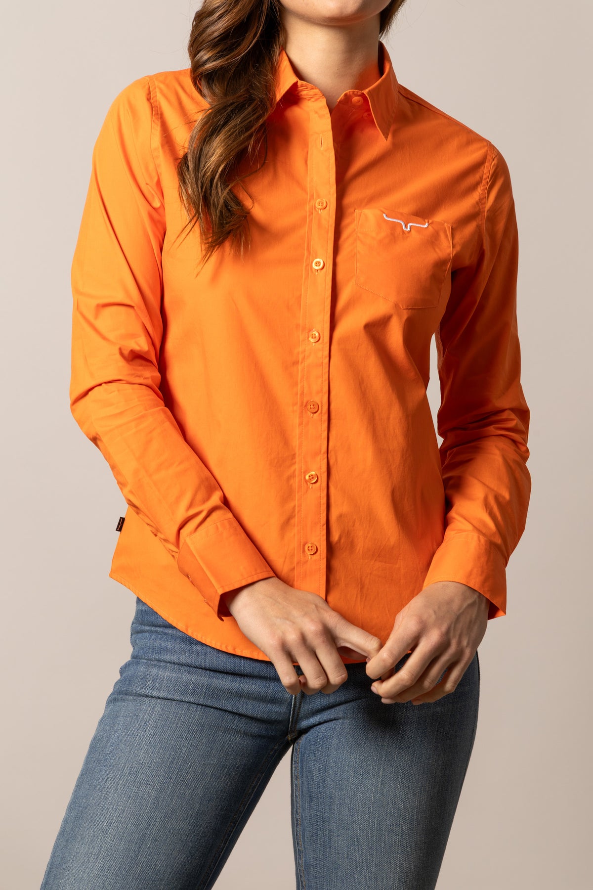 Kimes Ranch Ladies KR Team Shirt in Vintage Orange with long sleeves and a chest pocket featuring the Kimes Ranch logo