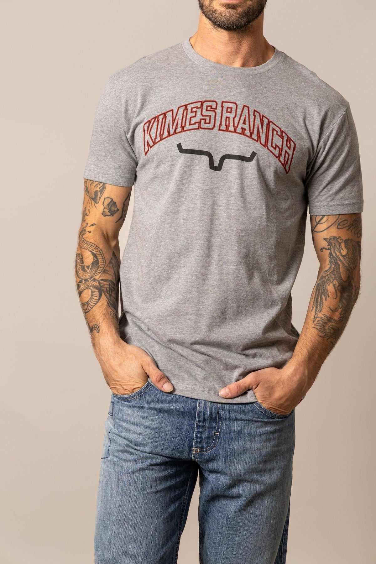 Kimes Ranch KR University Grey Heather t-shirt with a red arched Kimes Ranch logo and black Kimes Ranch logo mark