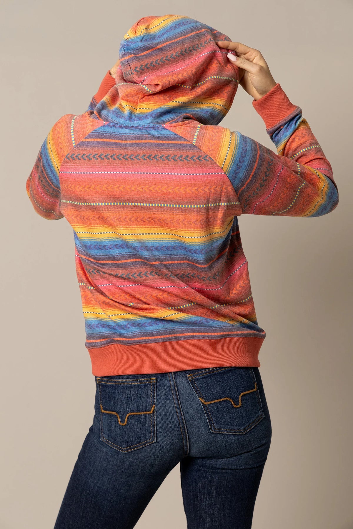 Kimes Ranch Kenzie Hoodie in Blue, back view, with multicolor horizontal stripes and ribbed cuffs