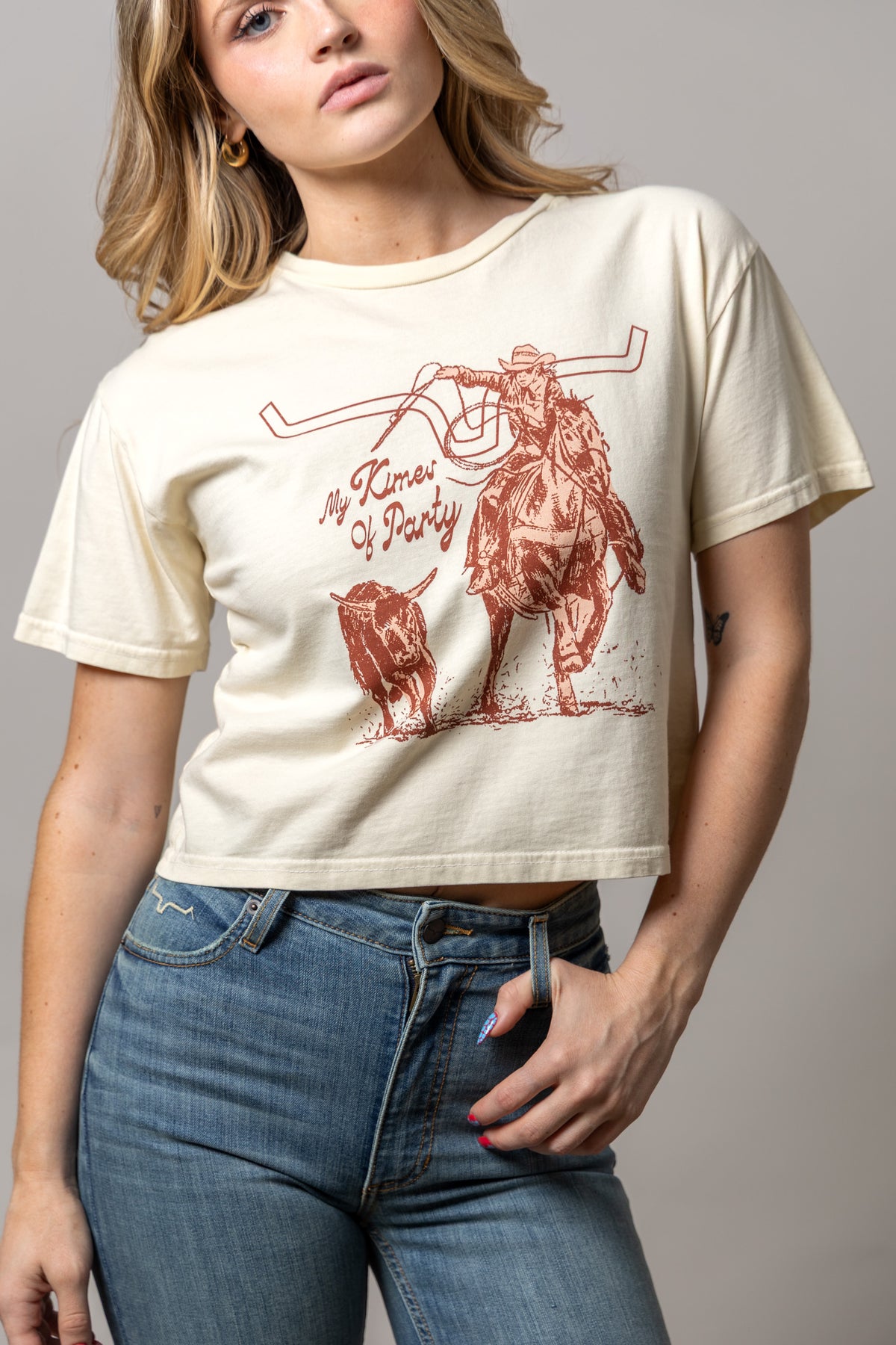 Kimes Ranch Kimes Of A Party shirt in Ivory with a cowboy on horseback and the text My Kimes Of Party
