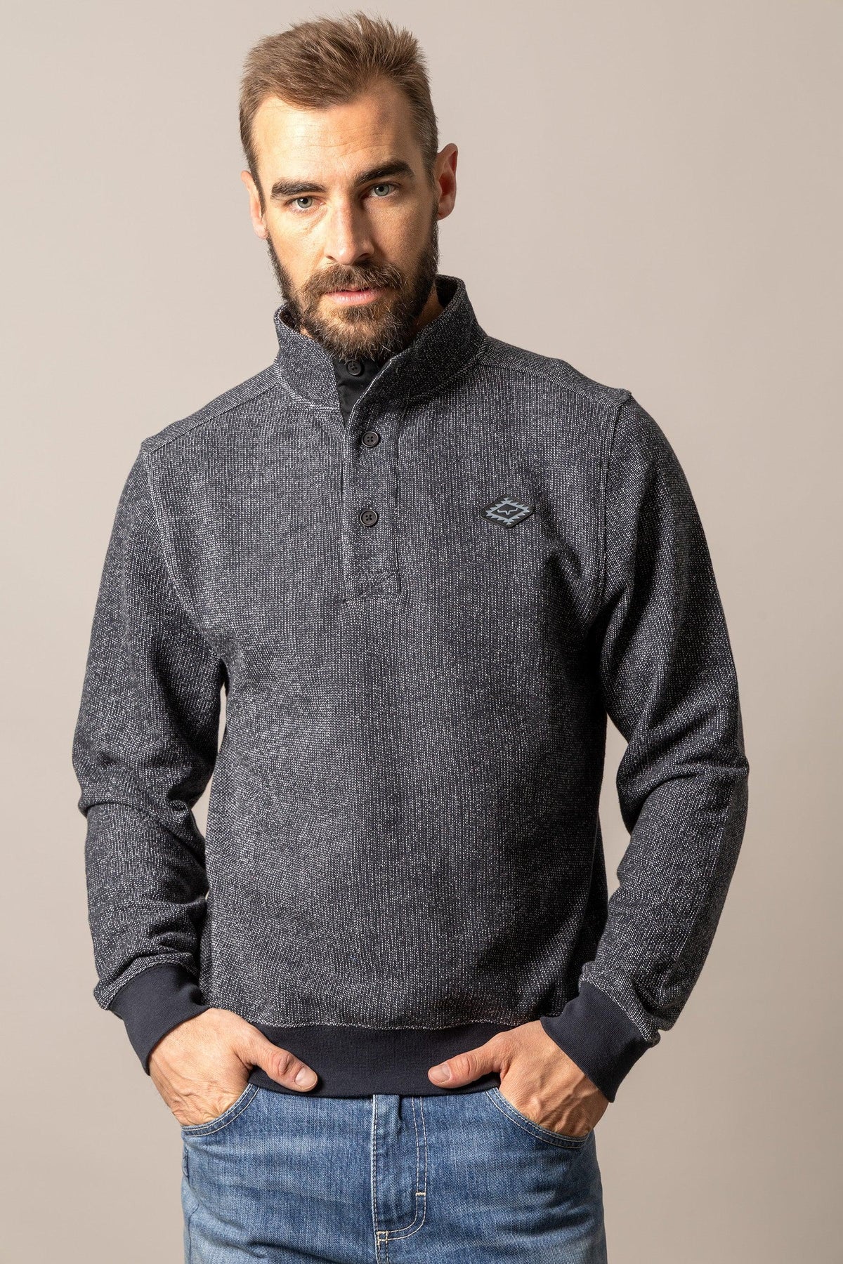 Kimes Ranch Kingswell sweatshirt in Black with a stand collar, button placket, and Kimes Ranch logo on the chest