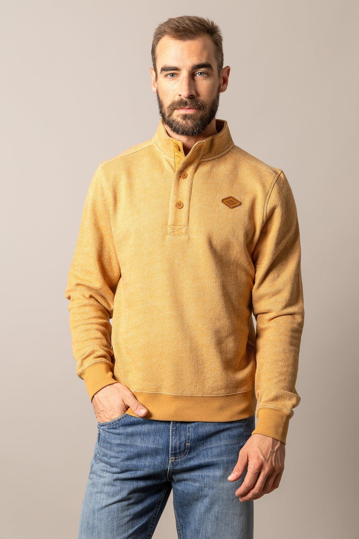 Kimes Ranch Kingswell sweatshirt in Work Wear Brown with a stand collar, three-button placket, and logo patch