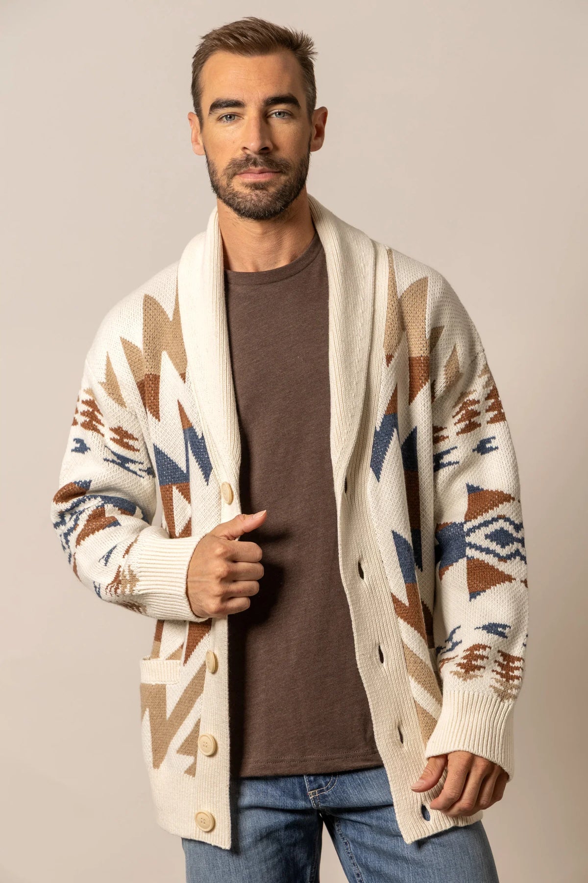 Kimes Ranch Knox Cardigan in Natural with a geometric pattern in brown and blue and front pockets