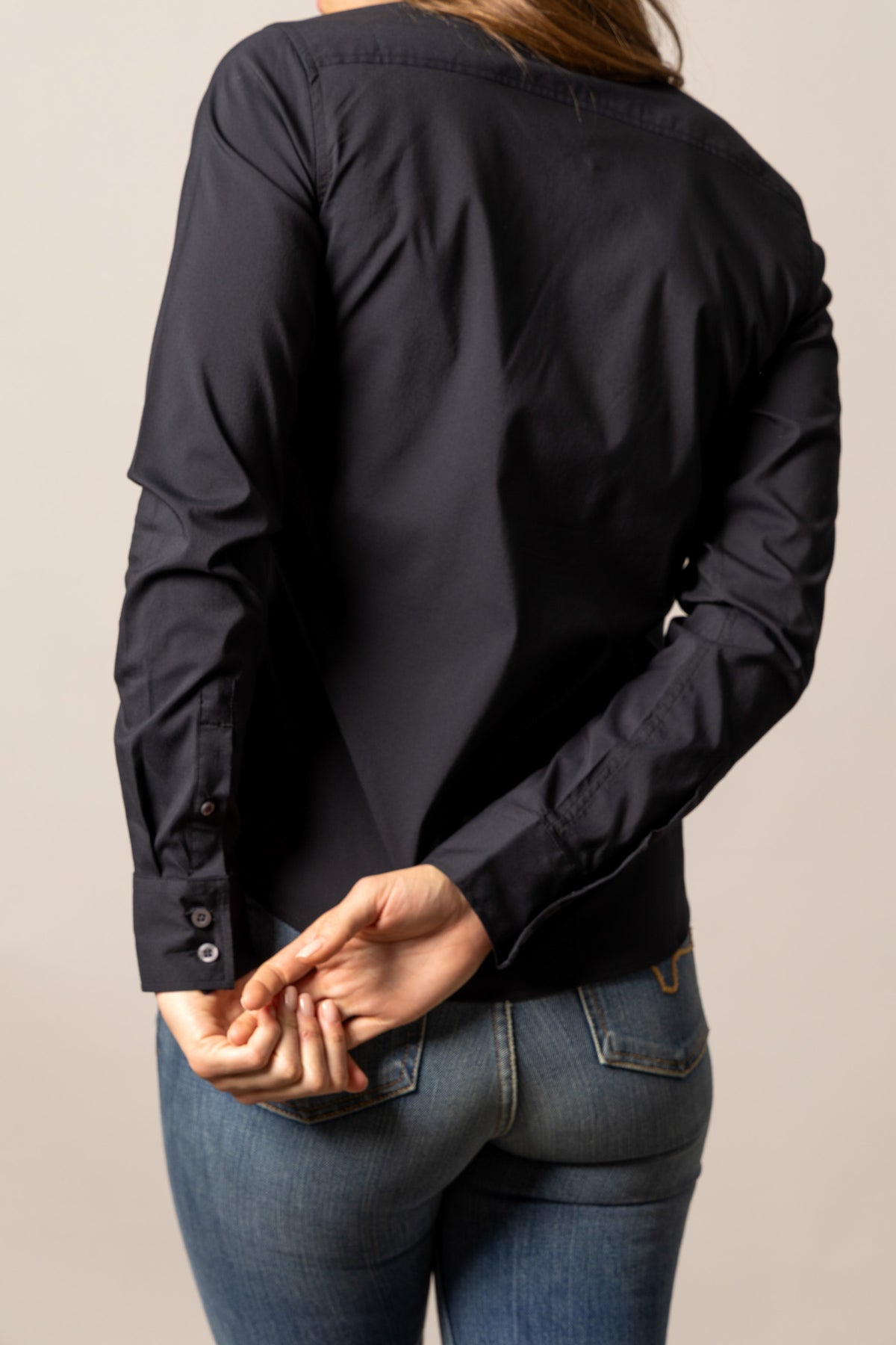 Kimes Ranch Ladies KR Team Shirt in Black, back view, with long sleeves and buttoned cuffs