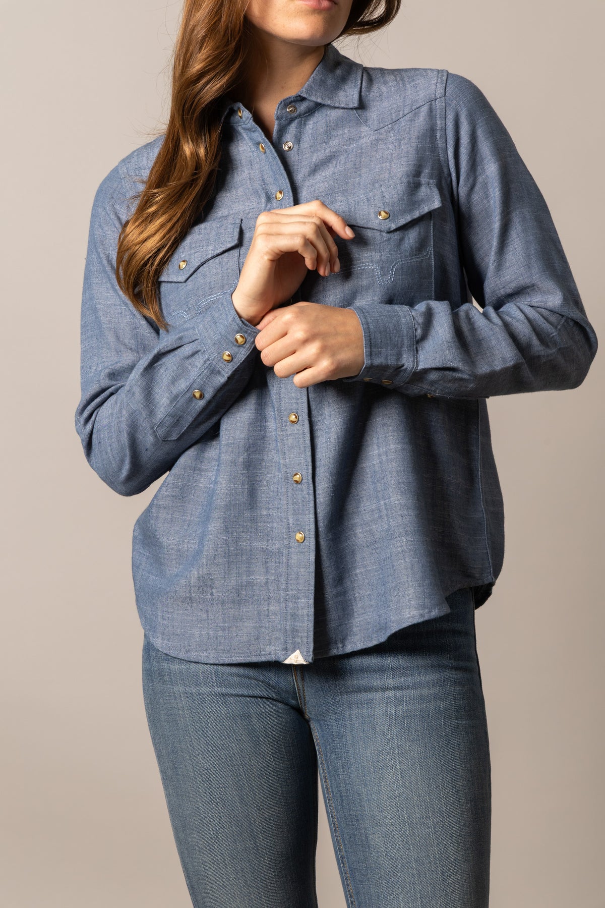 Kimes Ranch Lacy top in Blue with long sleeves, button front, and chest pockets