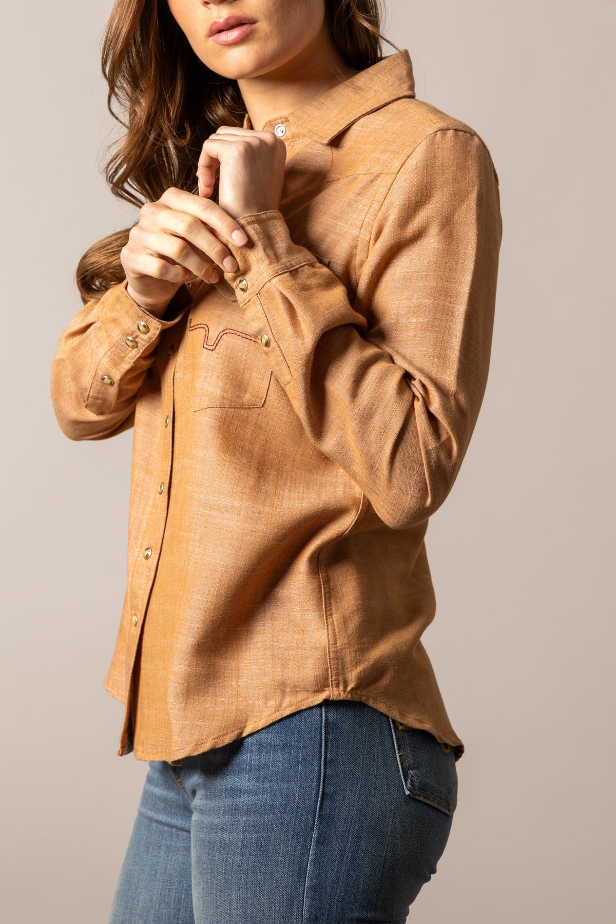 Kimes Ranch Lacy long sleeve top in Tobacco, side view, with contrast stitching and snap buttons