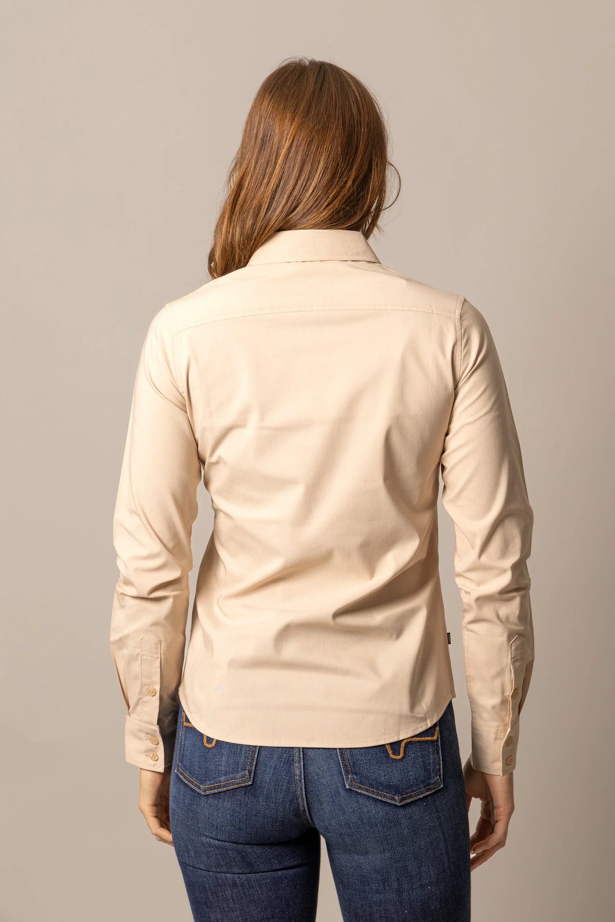 Kimes Ranch Ladies Linville top in Natural, back view, with a back yoke and buttoned sleeve cuffs