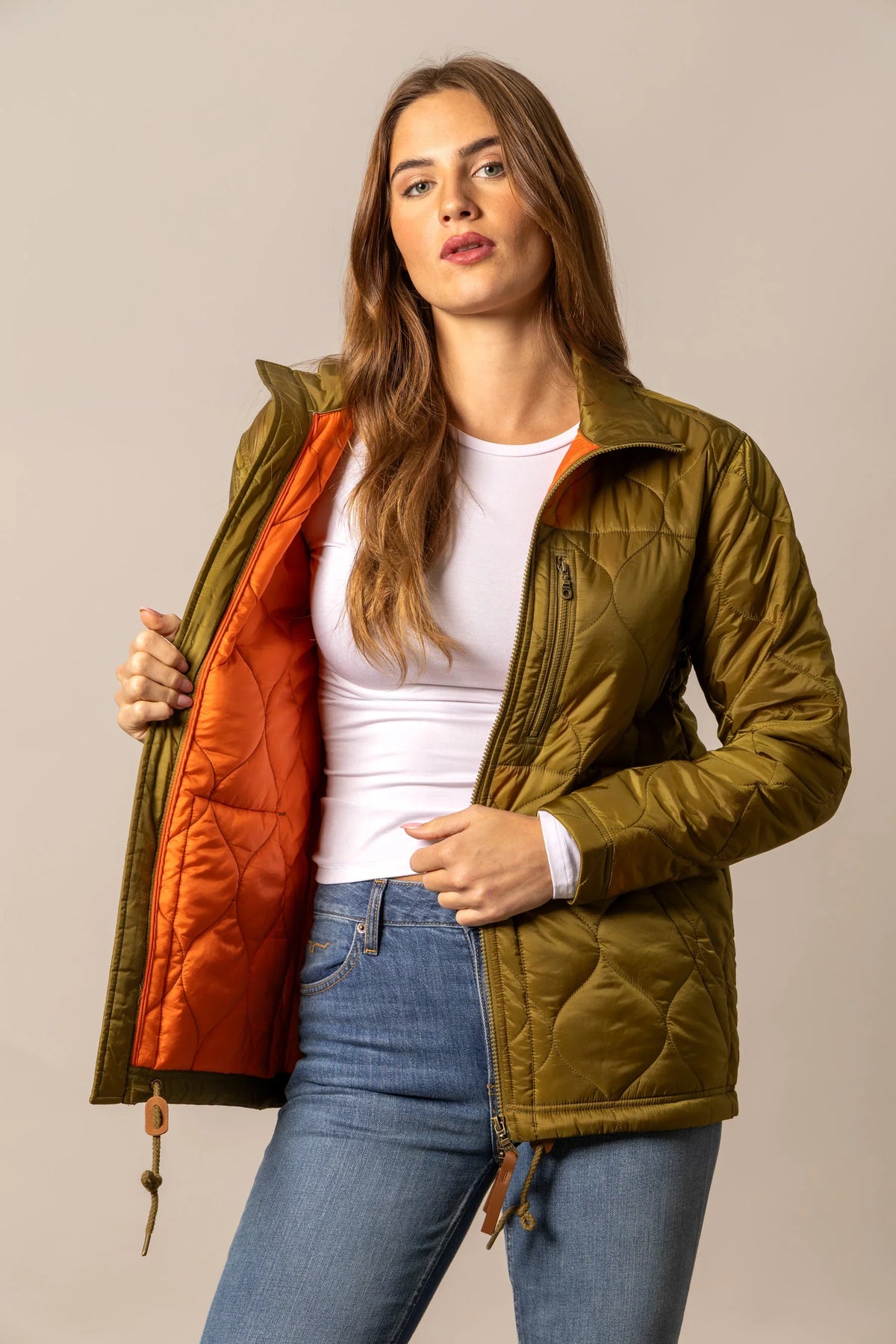Kimes Ranch Lara Jacket in Olive with a quilted diamond pattern and a bright orange interior lining