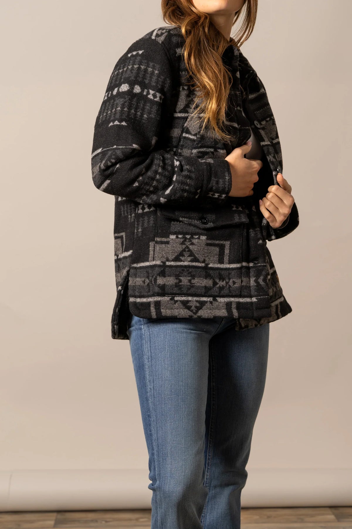 Kimes Ranch Lauren Wool Jacket in Black, side view, with a geometric pattern and front pockets