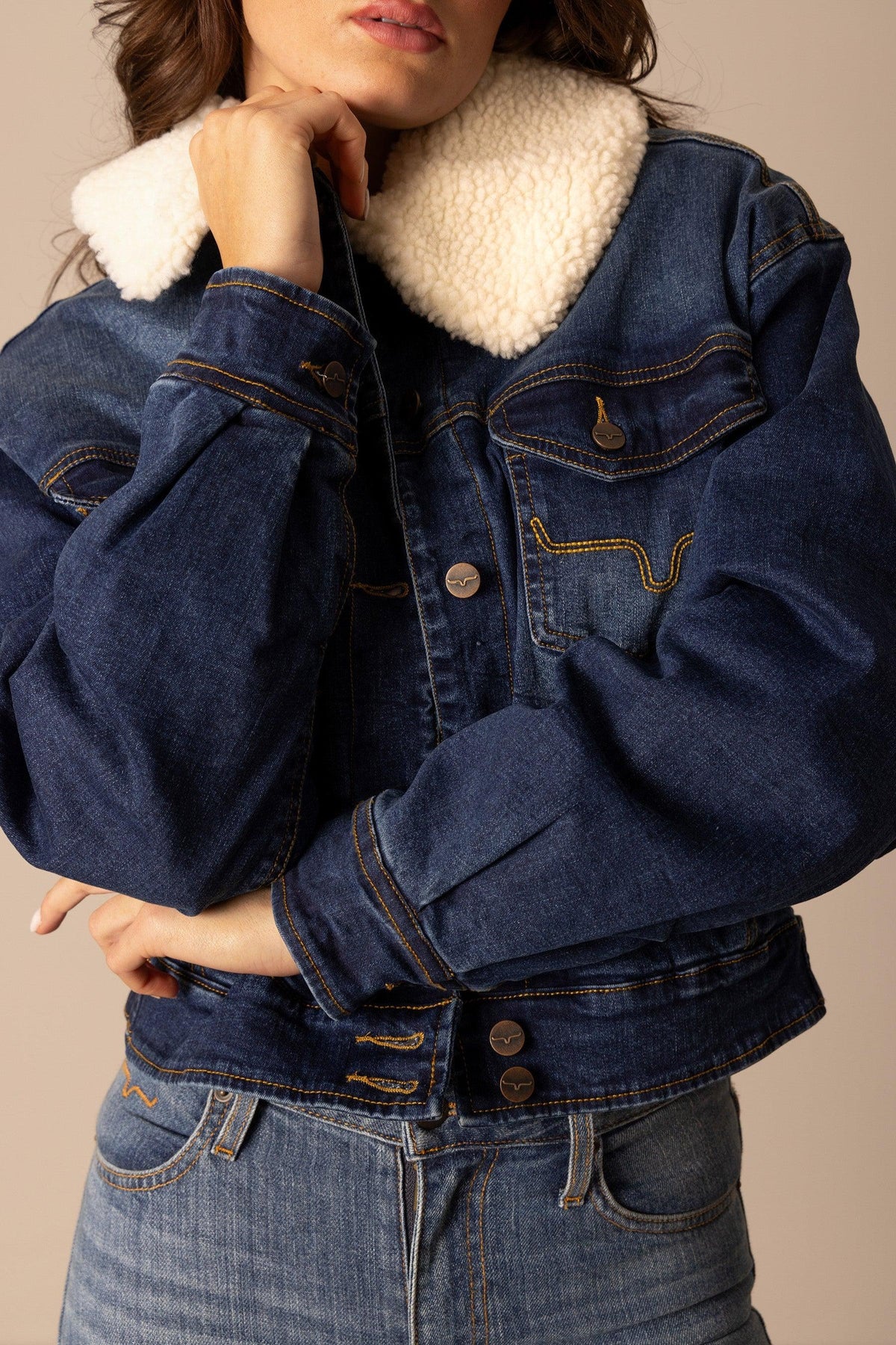 Kimes Ranch Leela Denim Jacket in Dark Indigo with a cream sherpa collar and embroidered yoke detail
