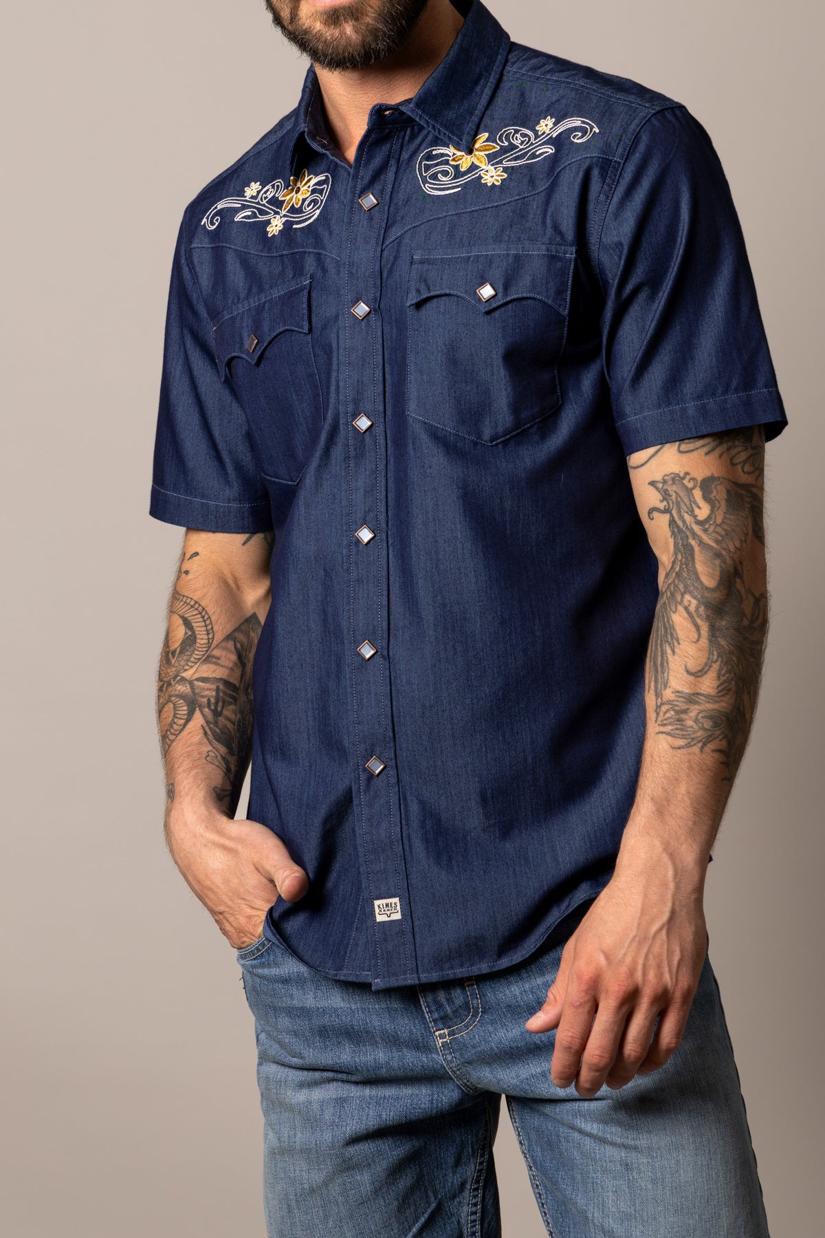 Kimes Ranch Leland short sleeve dress shirt in Indigo with floral embroidery on the yoke and two chest pockets