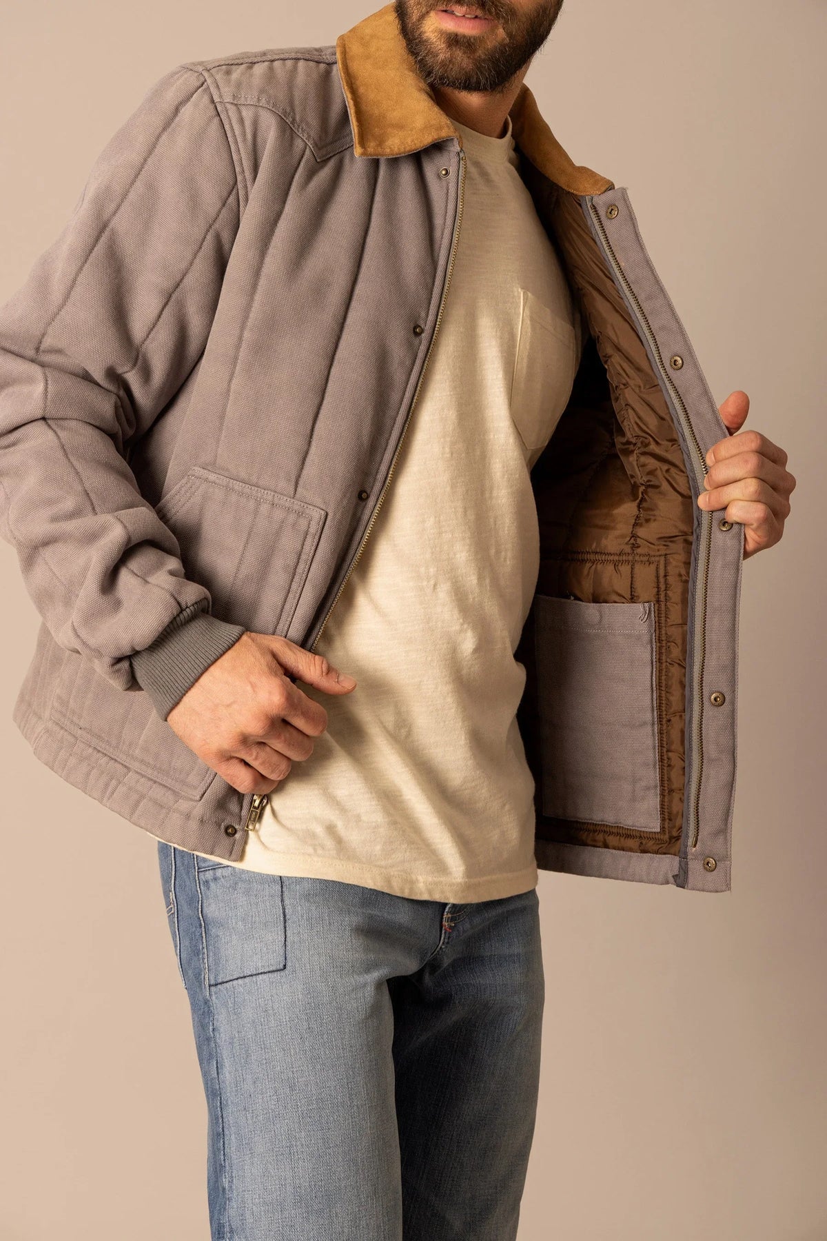 Kimes Ranch Lewiston Jacket in Grey, side view, with a tan collar and open front showing the interior pocket