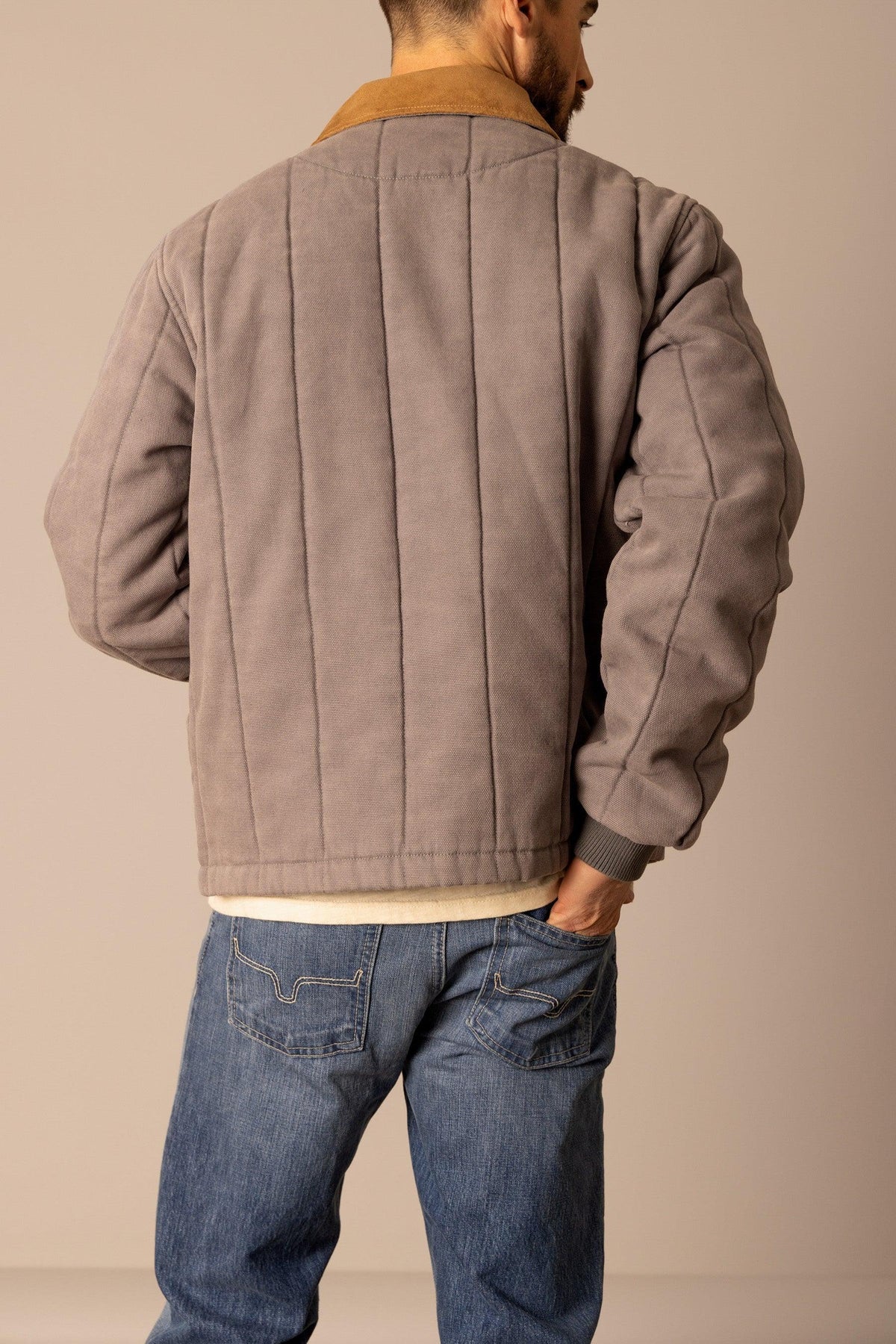 Kimes Ranch Lewiston Jacket in Grey, back view, with vertical stitching on the back and a tan collar