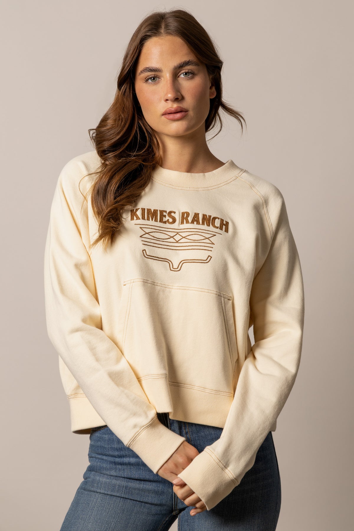 Kimes Ranch Lexie sweatshirt in Butter with long sleeves and a front kangaroo pocket
