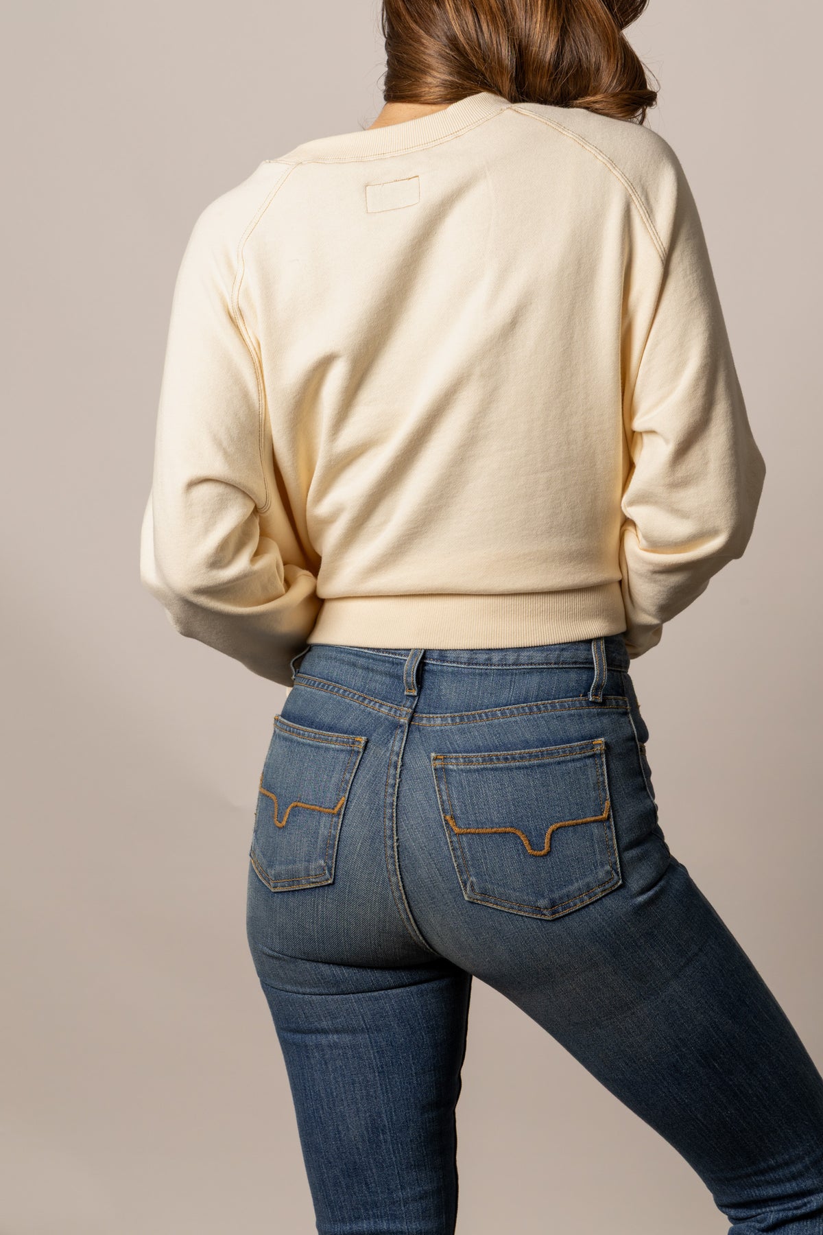 Kimes Ranch Lexie sweatshirt in Butter, back view, with long sleeves and a ribbed hem