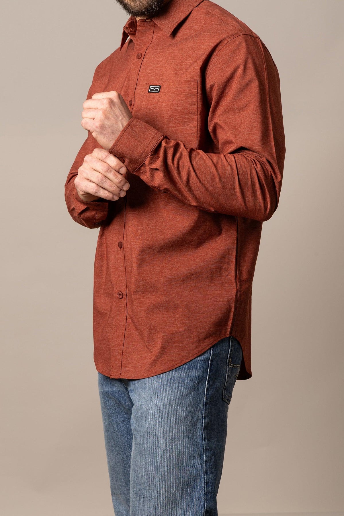 Kimes Ranch Linville Long Sleeve Dress Shirt in Dark Red, side view, with a chest pocket and Kimes Ranch logo