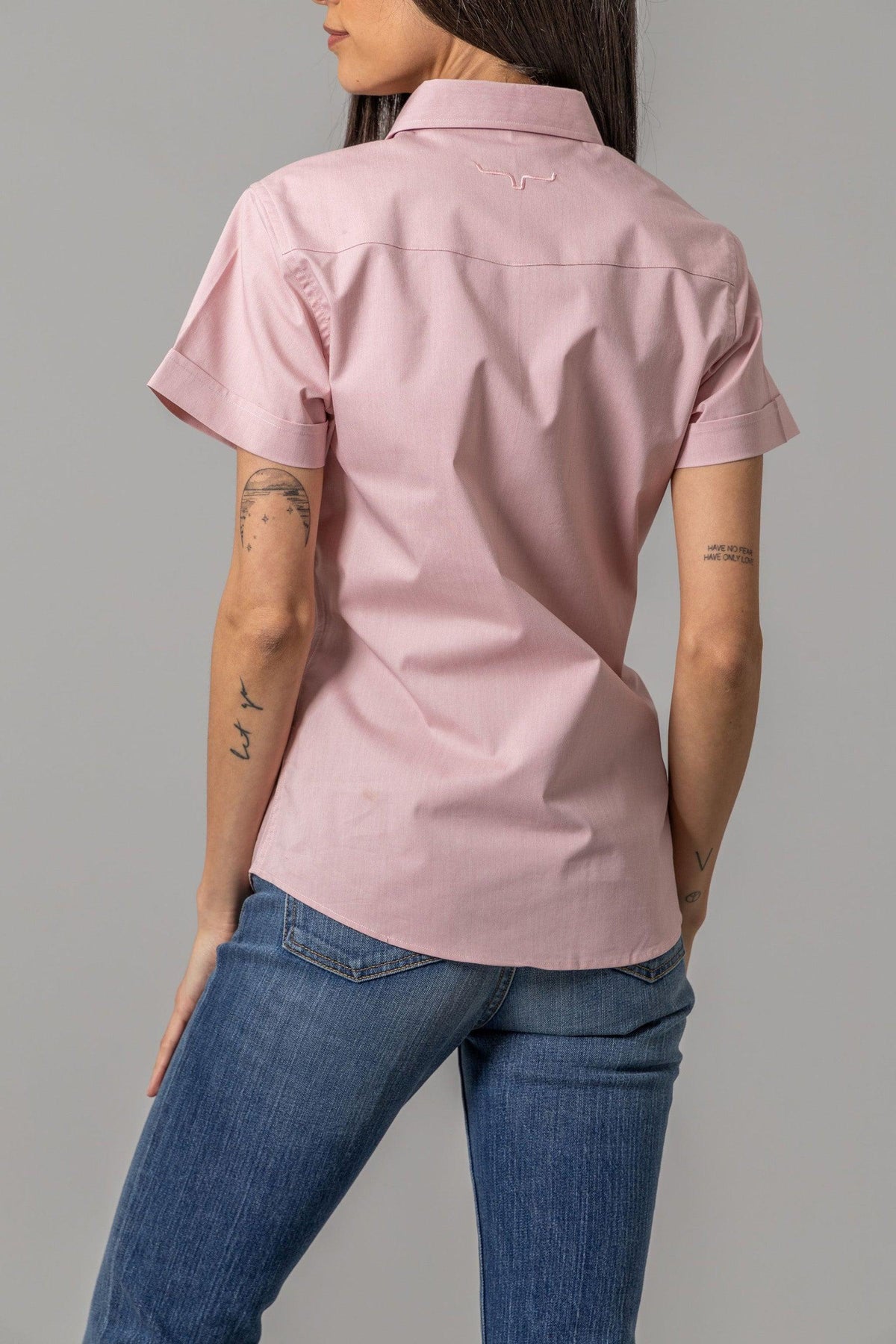 Kimes Ranch Ladies Linville Short Sleeve top in Pink, back view, with a back yoke and rolled short sleeves
